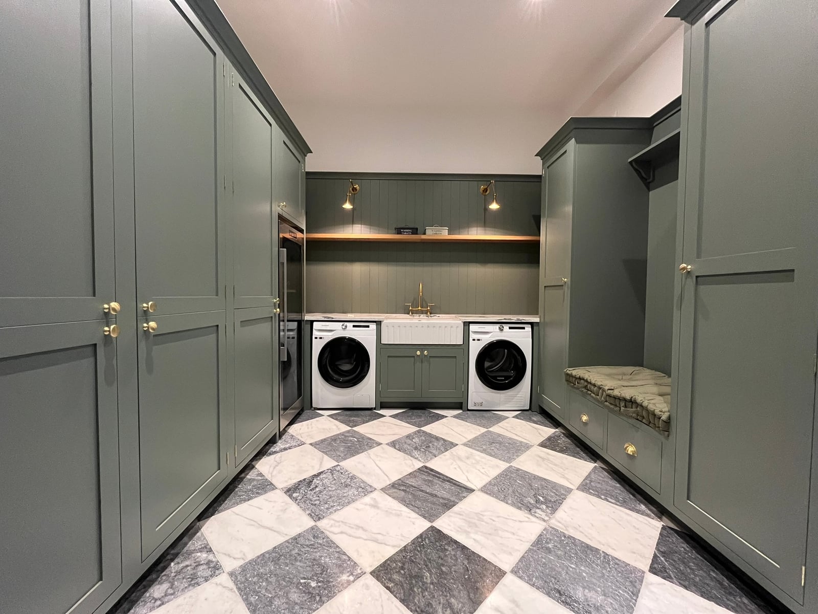Bespoke hand-painted utility room cabinetry in Herne Hill with precision fitting